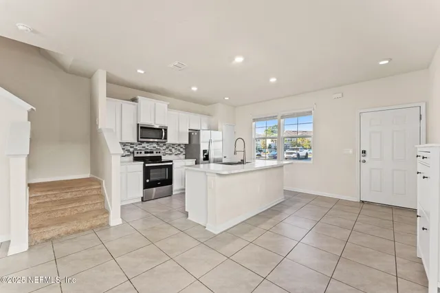 a view of outdoor space with trees & swimming pool