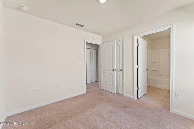 a swimming pool with plants