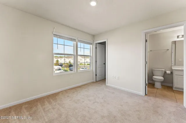 an ocean view with outdoor space and swimming pool