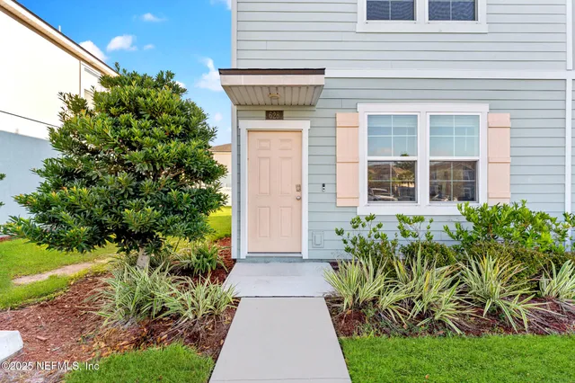 a view of a livingroom with a kitchen