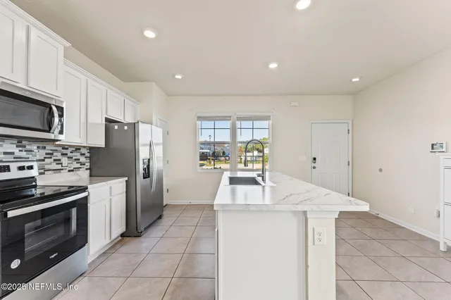 a view of room with window and hardwood floor