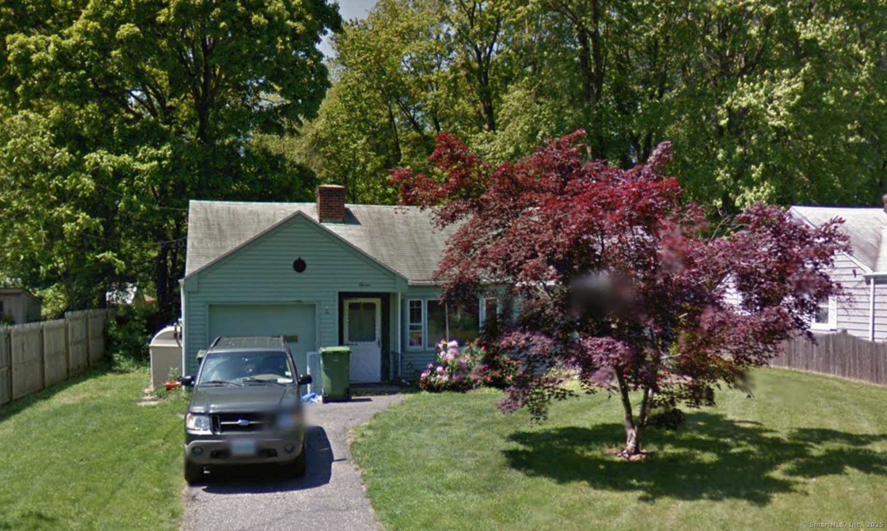 Undisclosed Address Windsor, CT 06095 - Photo 1 of 1 a front view of a house with garden