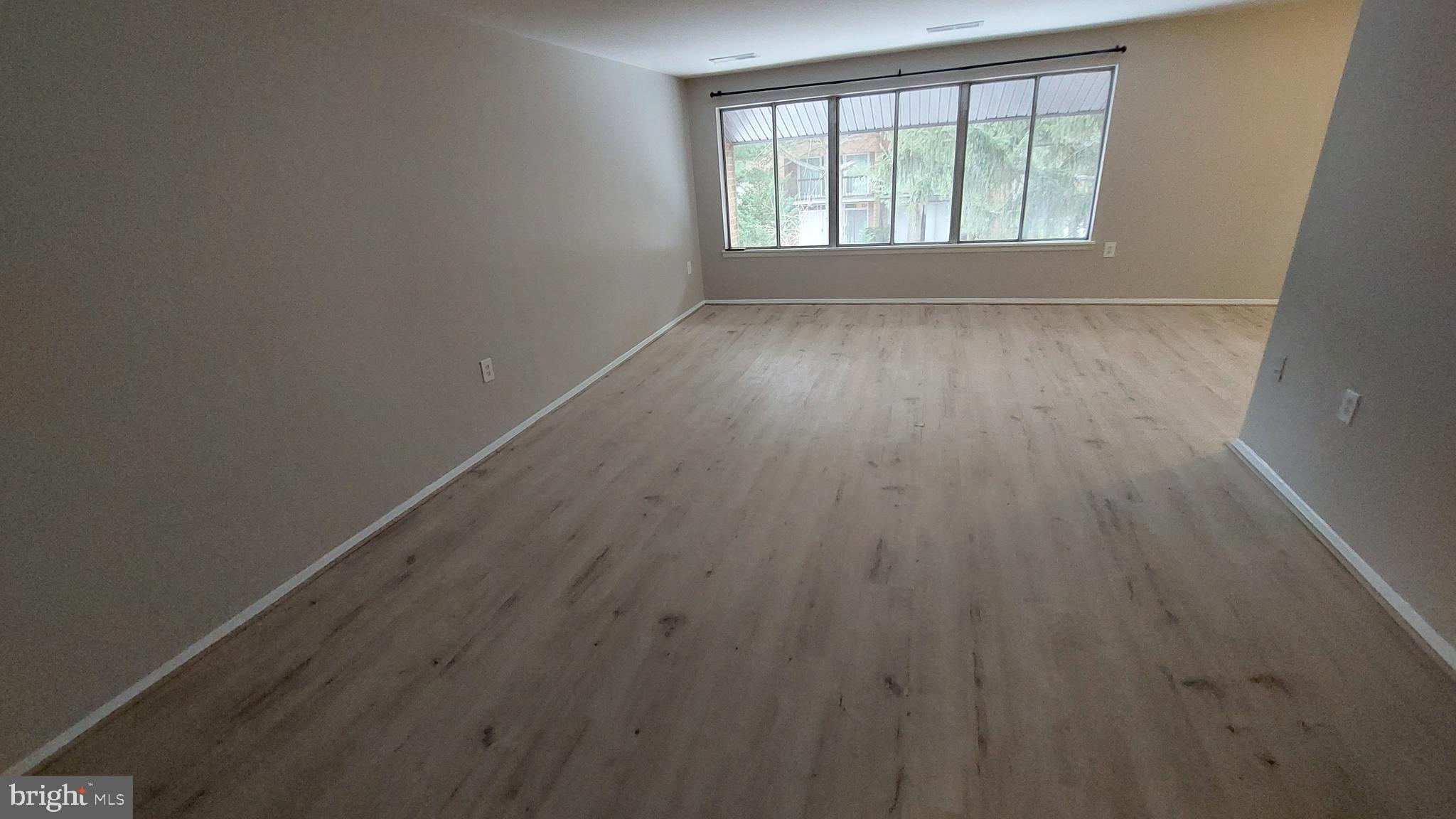 18622 Walkers Choice Road, Unit 6 Montgomery Village, MD 20886 - Photo 5 of 37 Living Room 2