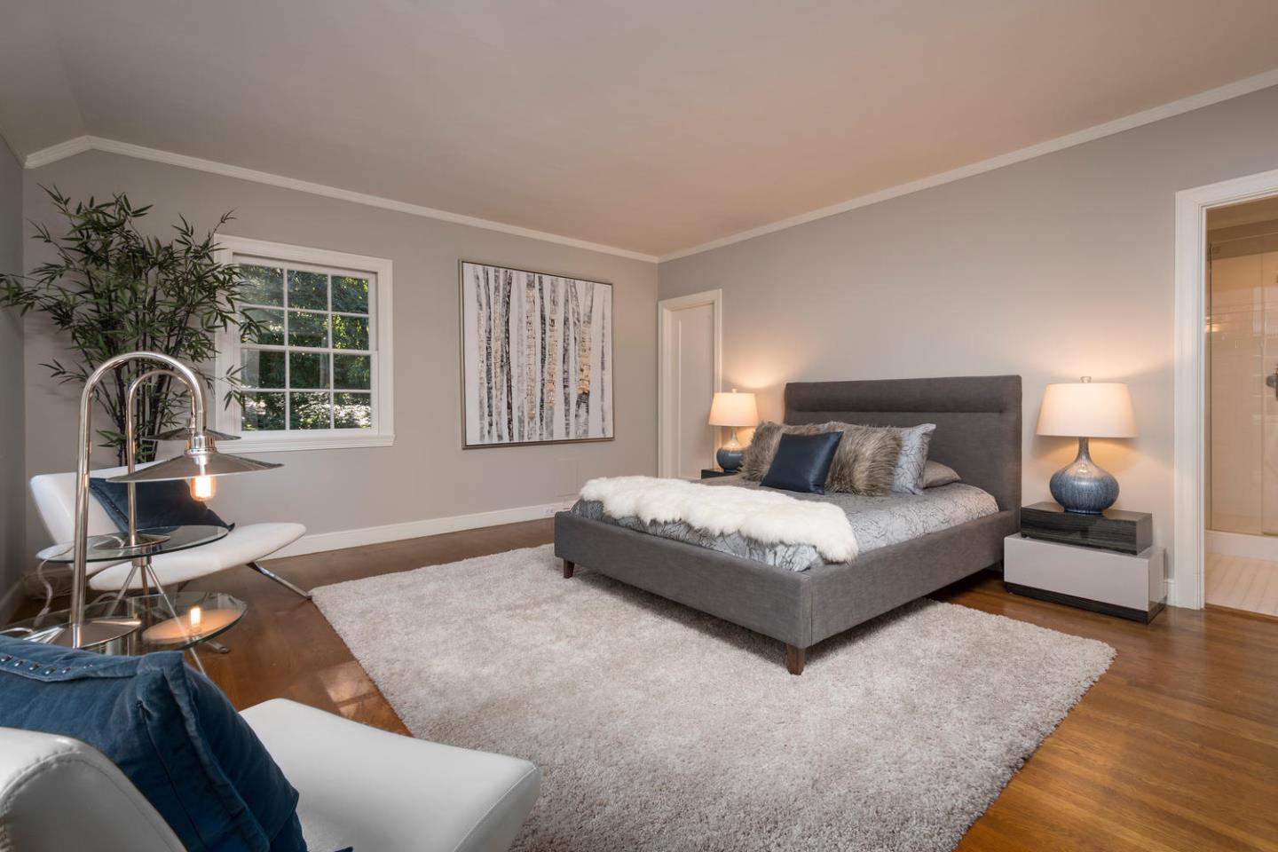 565 Hayne Road Hillsborough, CA 94010 - Photo 19 of 40 a bedroom with a bed chair and window