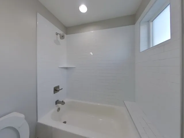 a bathroom with a bathtub