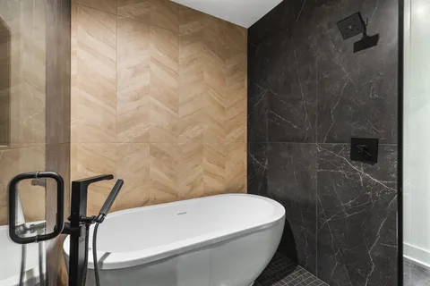 a bathroom with a white tub