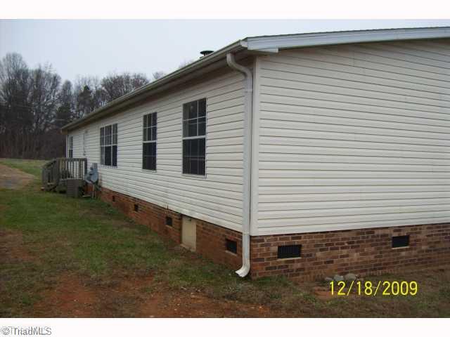 1562 Pinnacle Hotel Road Pinnacle, NC 27043 - Photo 2 of 11 Exterior Back.