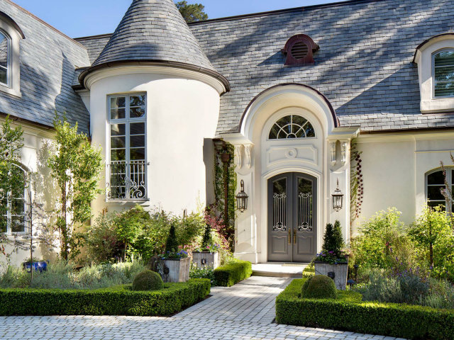 93 Serrano Drive Atherton, CA 94027 - Photo 1 of 10 a front view of a house with garden