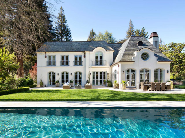 93 Serrano Drive Atherton, CA 94027 - Photo 2 of 10 a front view of house with yard and green space
