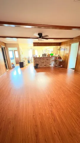 a view of water heater and wooden floor