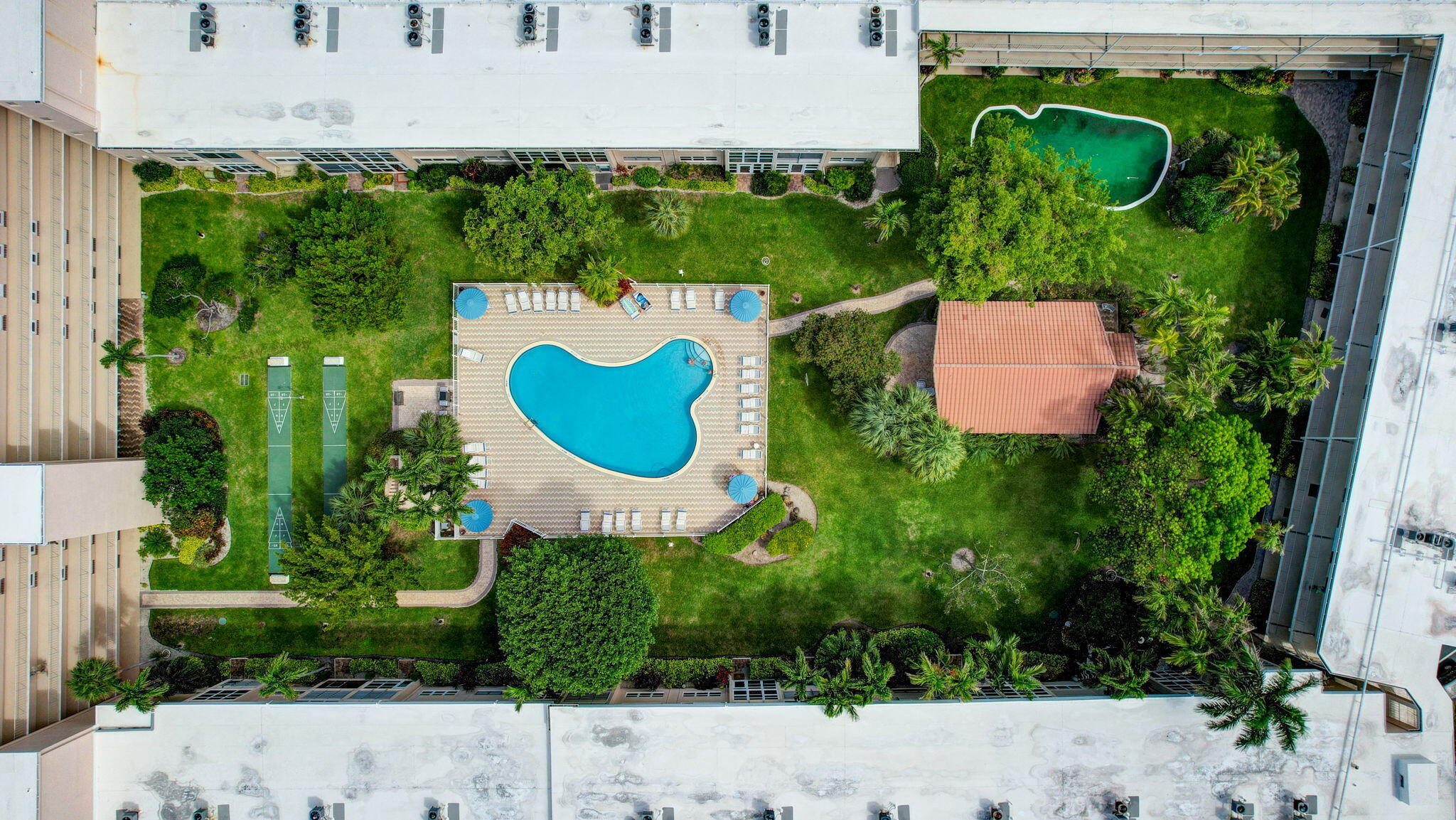 1481 South Ocean Boulevard, Unit 413A Lauderdale-by-the-Sea, FL 33062 - Photo 29 of 48 an aerial view of a house