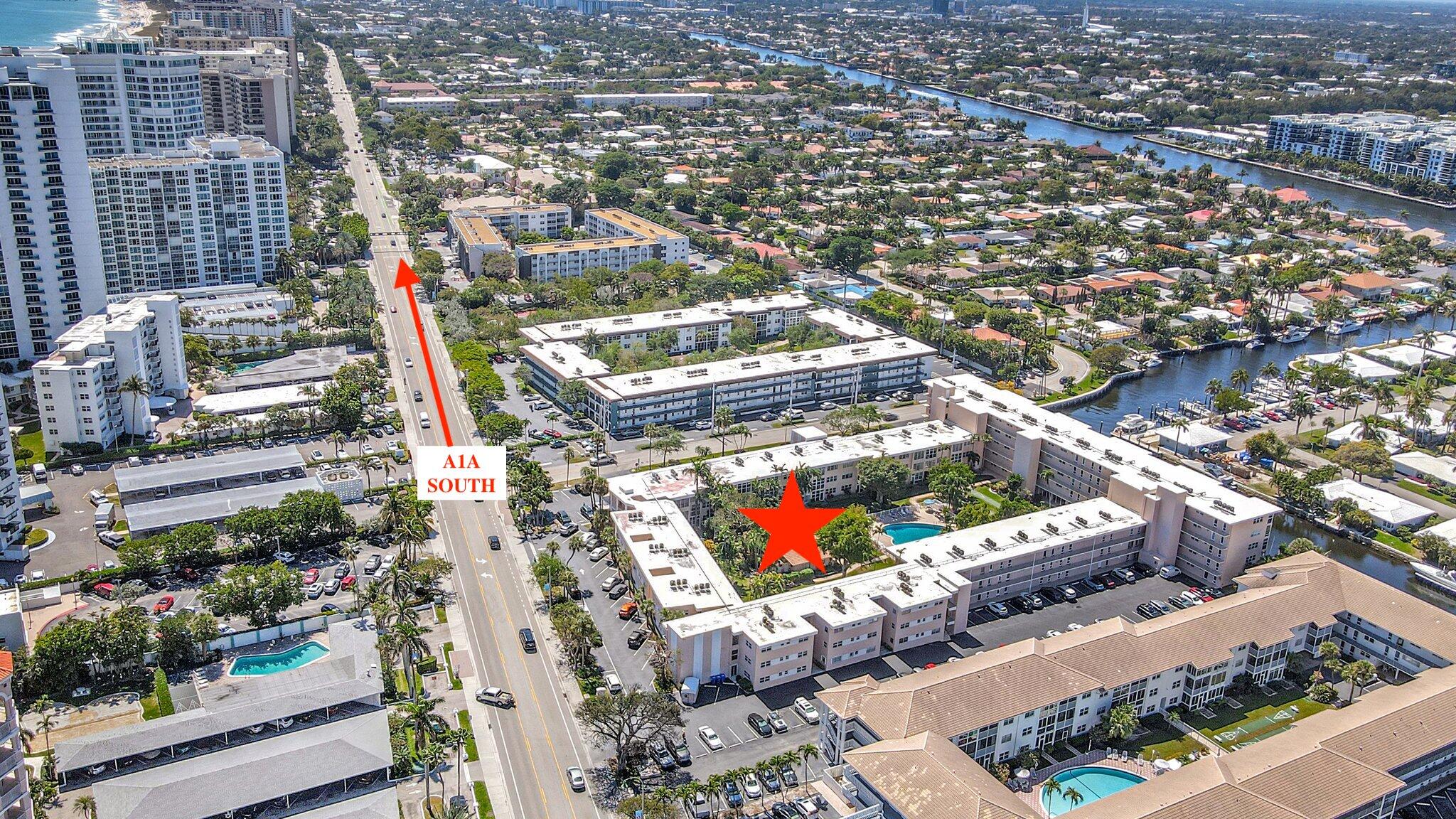 1481 South Ocean Boulevard, Unit 413A Lauderdale-by-the-Sea, FL 33062 - Photo 45 of 48 an aerial view of a city