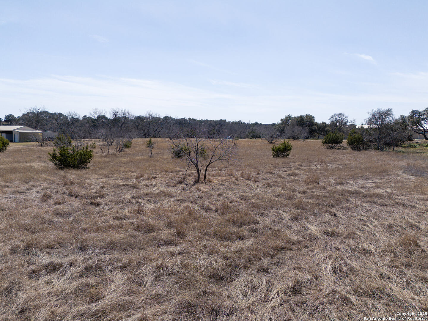 Lot 128 Rio Grande Drive Blanco, TX 78606 - Photo 8 of 9 a view of an outdoor space and a mountain view