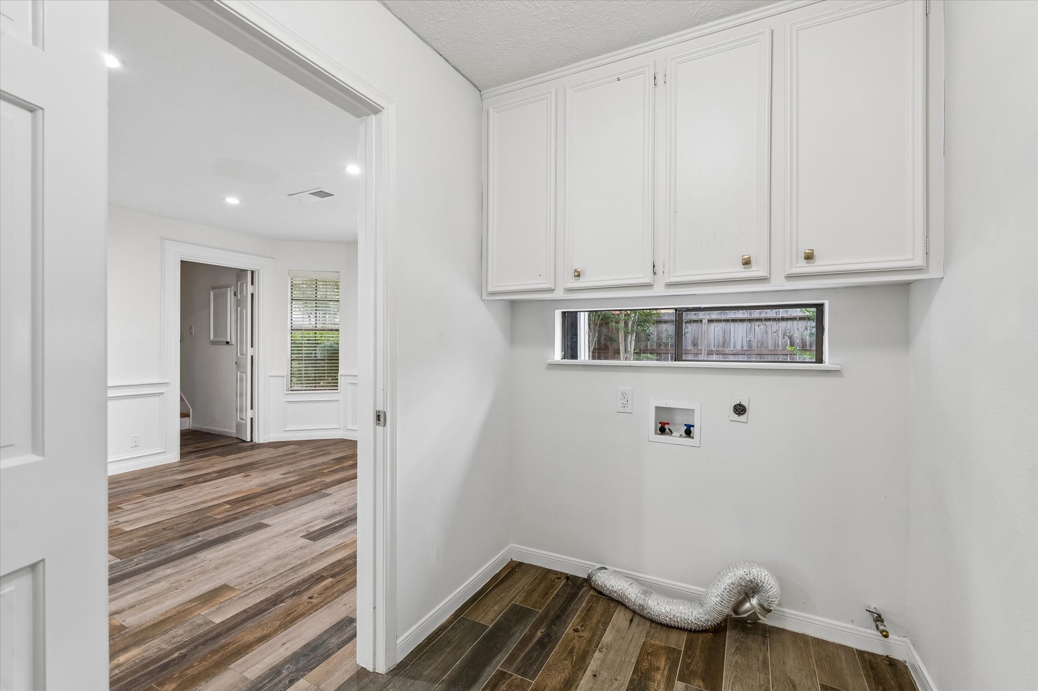 17902 Fernbluff Drive Spring, TX 77379 - Photo 27 of 29 a view of a room with wooden floor and cabinet