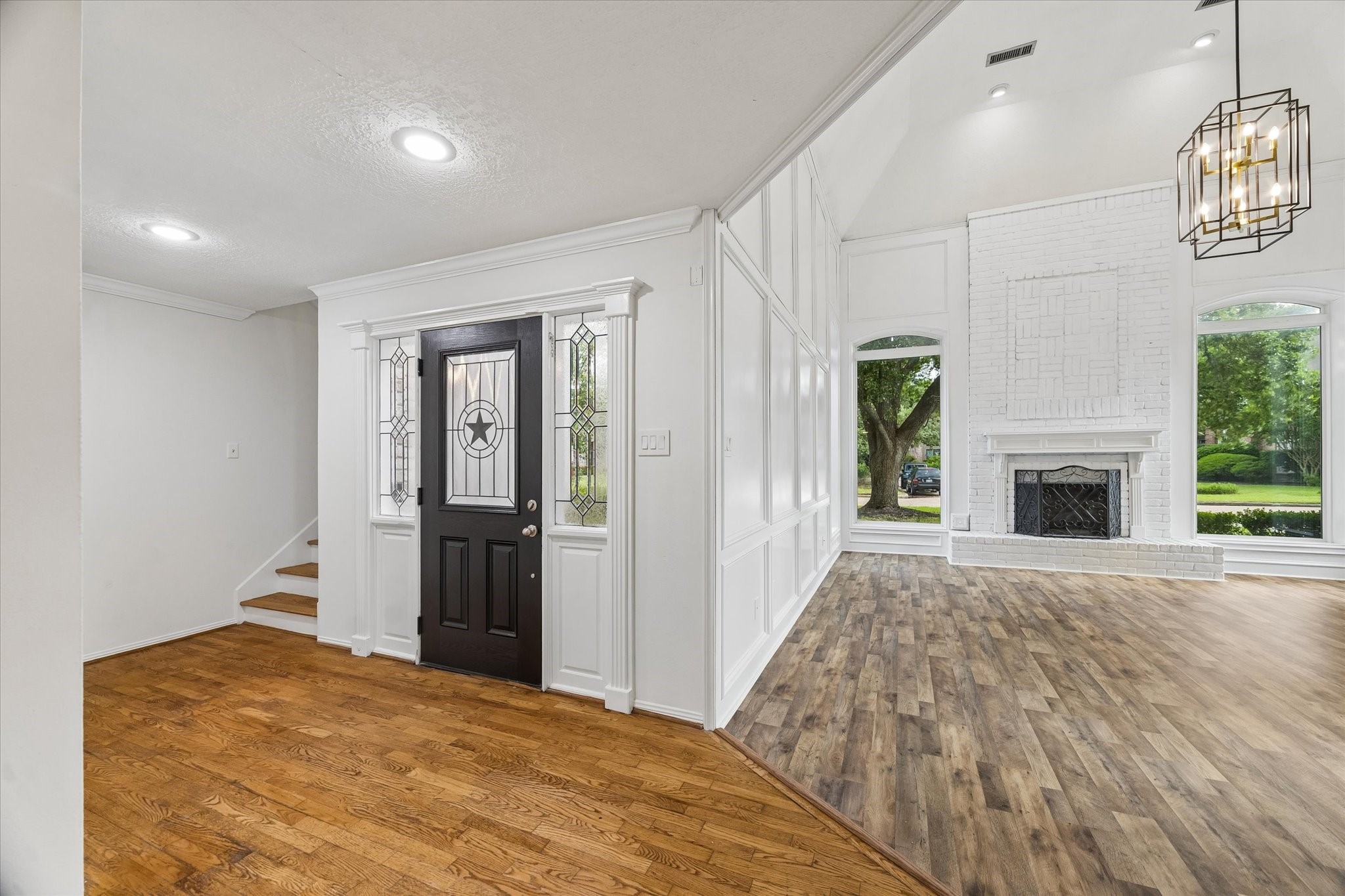 17902 Fernbluff Drive Spring, TX 77379 - Photo 3 of 29 a view of empty room with wooden floor and fireplace