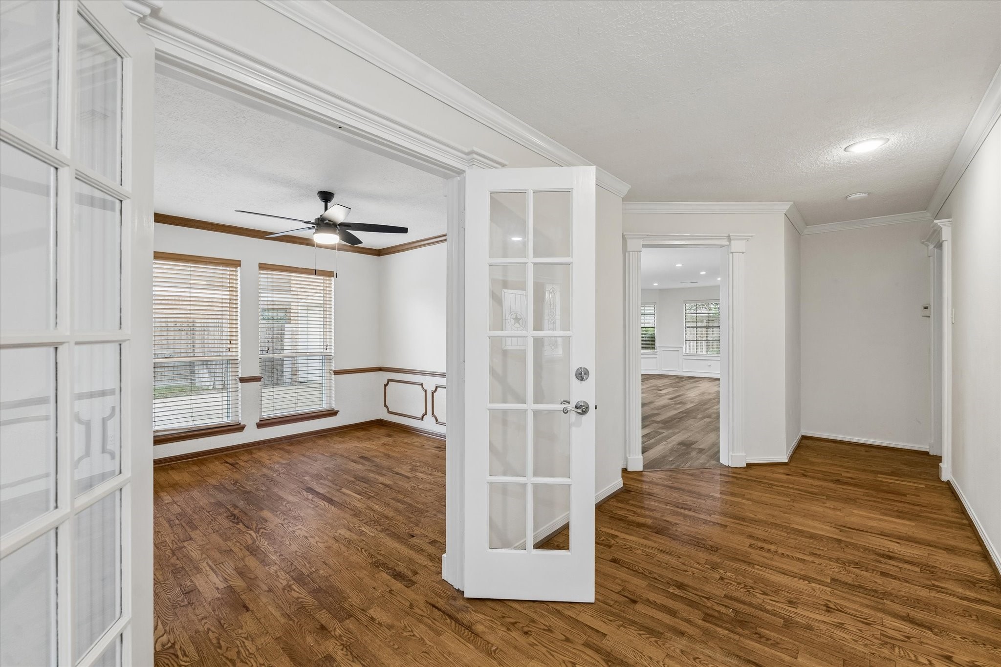 17902 Fernbluff Drive Spring, TX 77379 - Photo 8 of 29 a view of empty room with wooden floor and fan