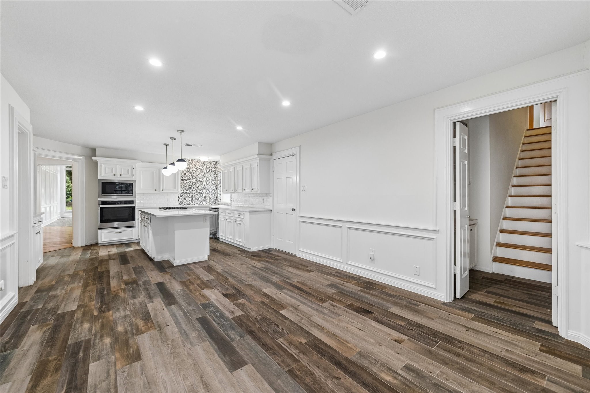 17902 Fernbluff Drive Spring, TX 77379 - Photo 10 of 29 a view of a kitchen and wooden floor