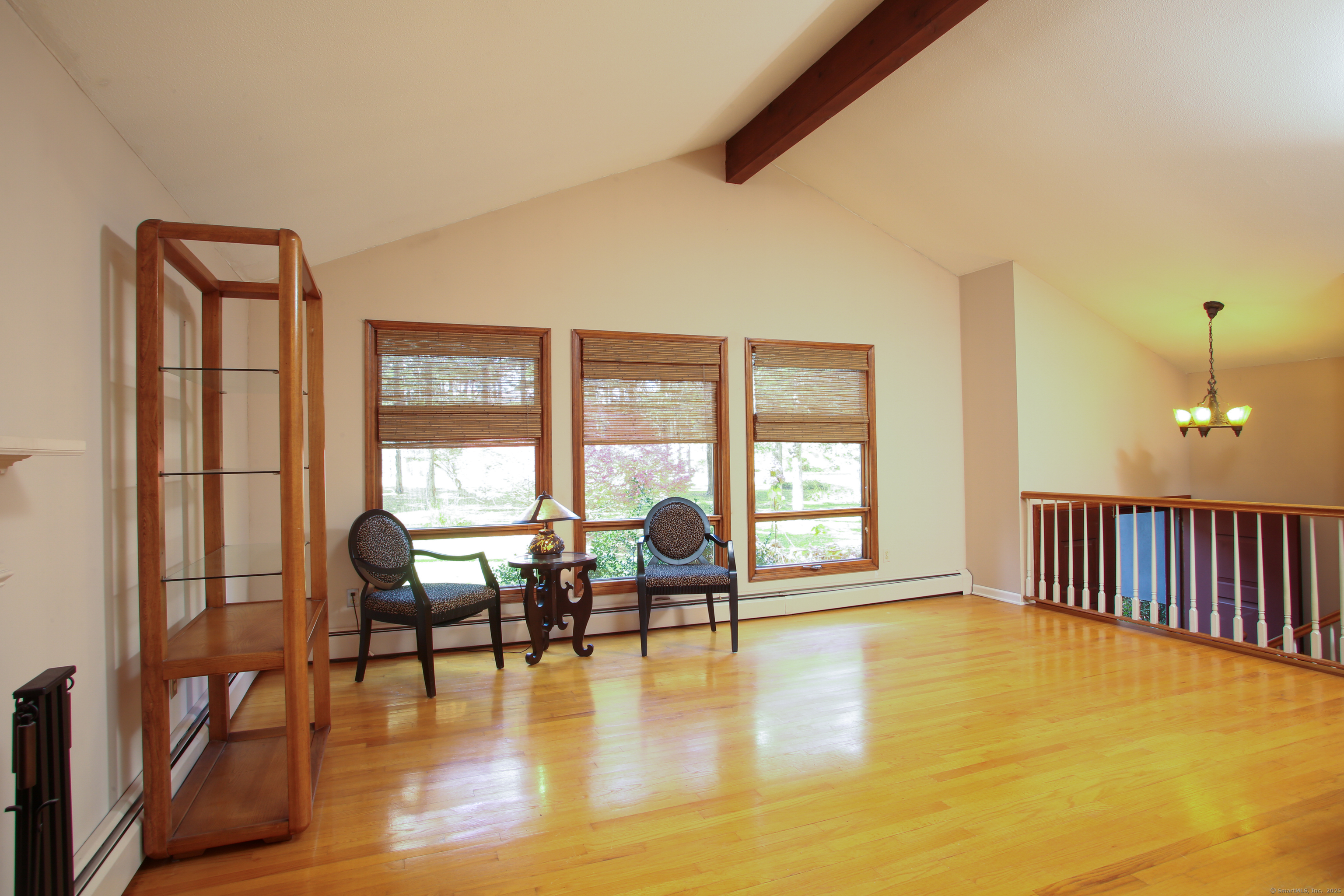 118 Washinee Heights Road Salisbury, CT 06068 - Photo 6 of 31 a living room with furniture and a floor to ceiling window