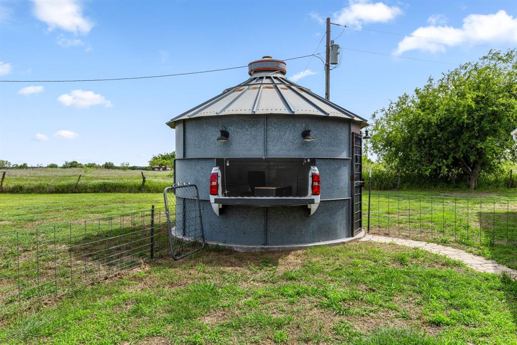 13315 Highway 281 Scotland, TX 76379 - Photo 33 of 40 Galvanized metal grain bin converted to kitchen serving area. Built-in service window with working taillights included. Tailgate party!