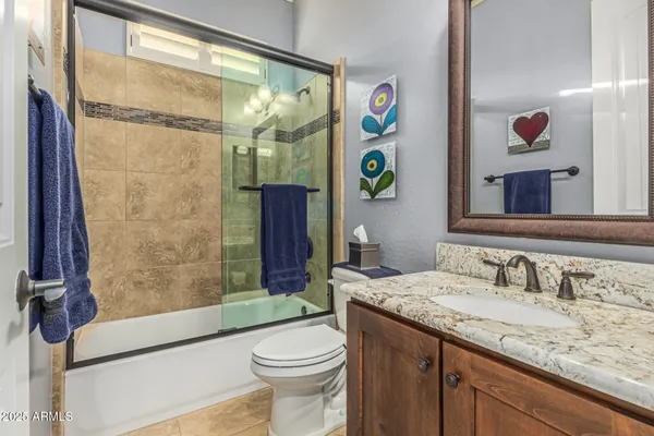 a swimming pool with outdoor seating and yard