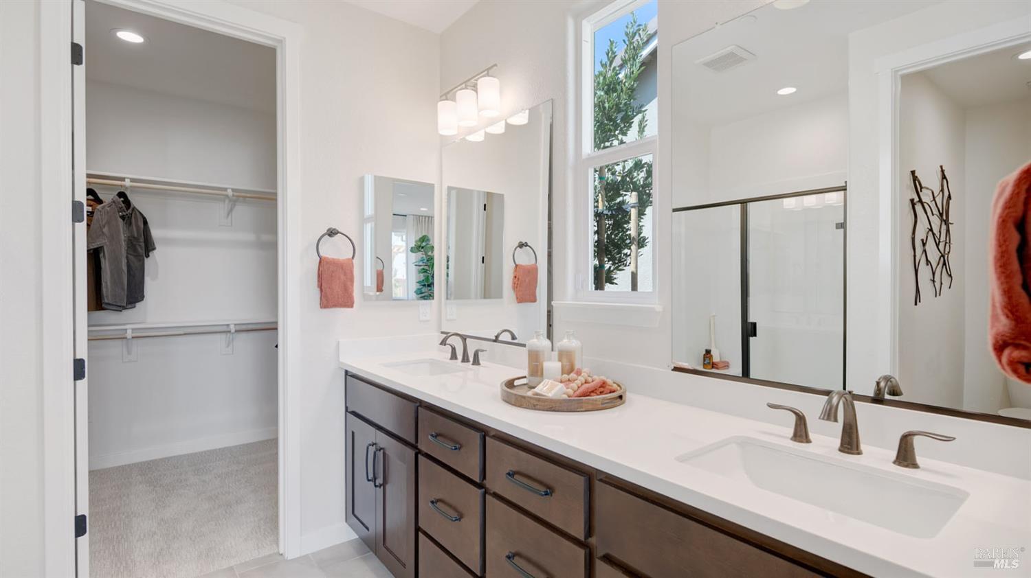 2640 Hopscotch Street Rio Vista, CA 94571 - Photo 34 of 51 a bathroom with a double vanity sink and mirror