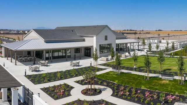 a view of a kitchen with a table and chairs