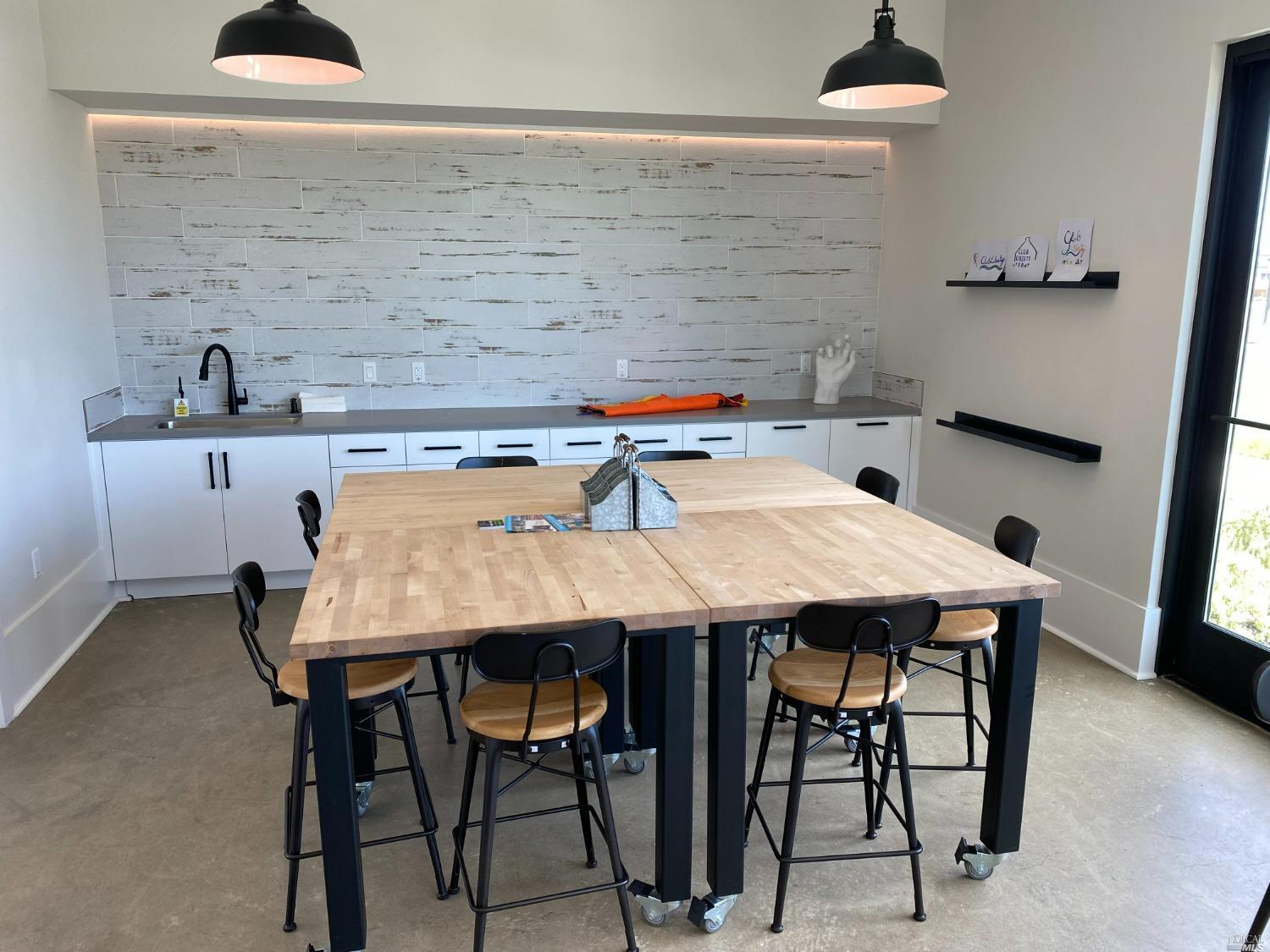 2640 Hopscotch Street Rio Vista, CA 94571 - Photo 50 of 51 a dining table with chairs and cabinets