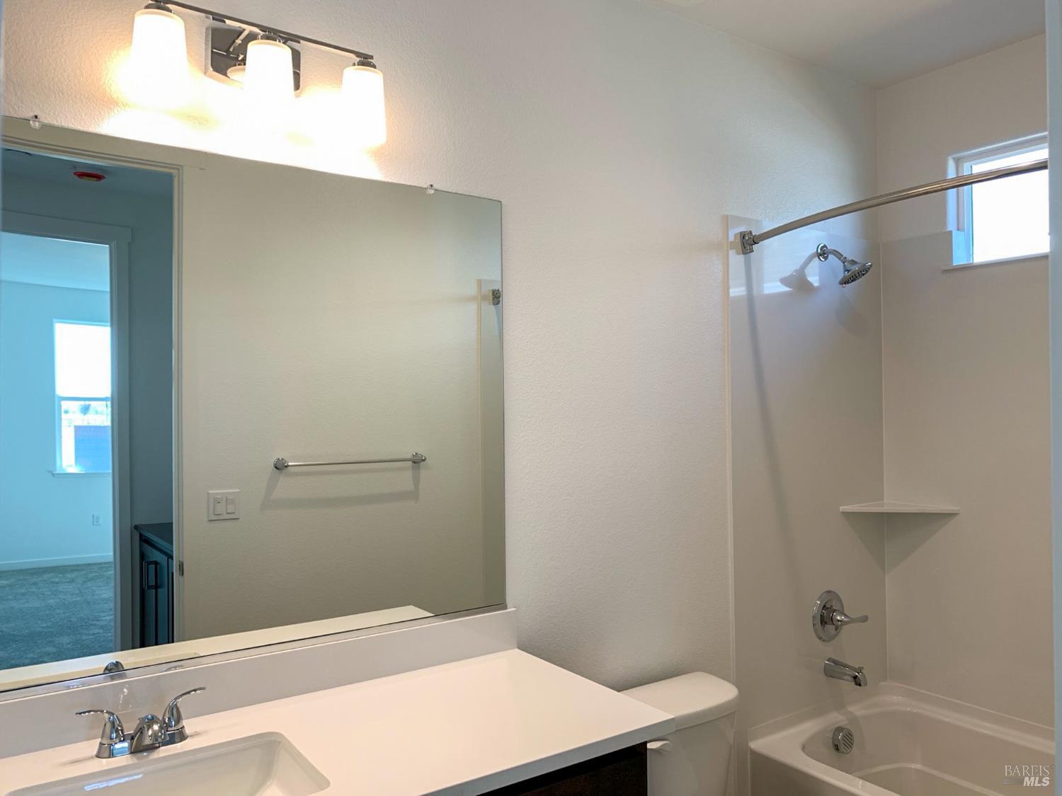 2640 Hopscotch Street Rio Vista, CA 94571 - Photo 10 of 51 a bathroom with a sink a toilet and shower