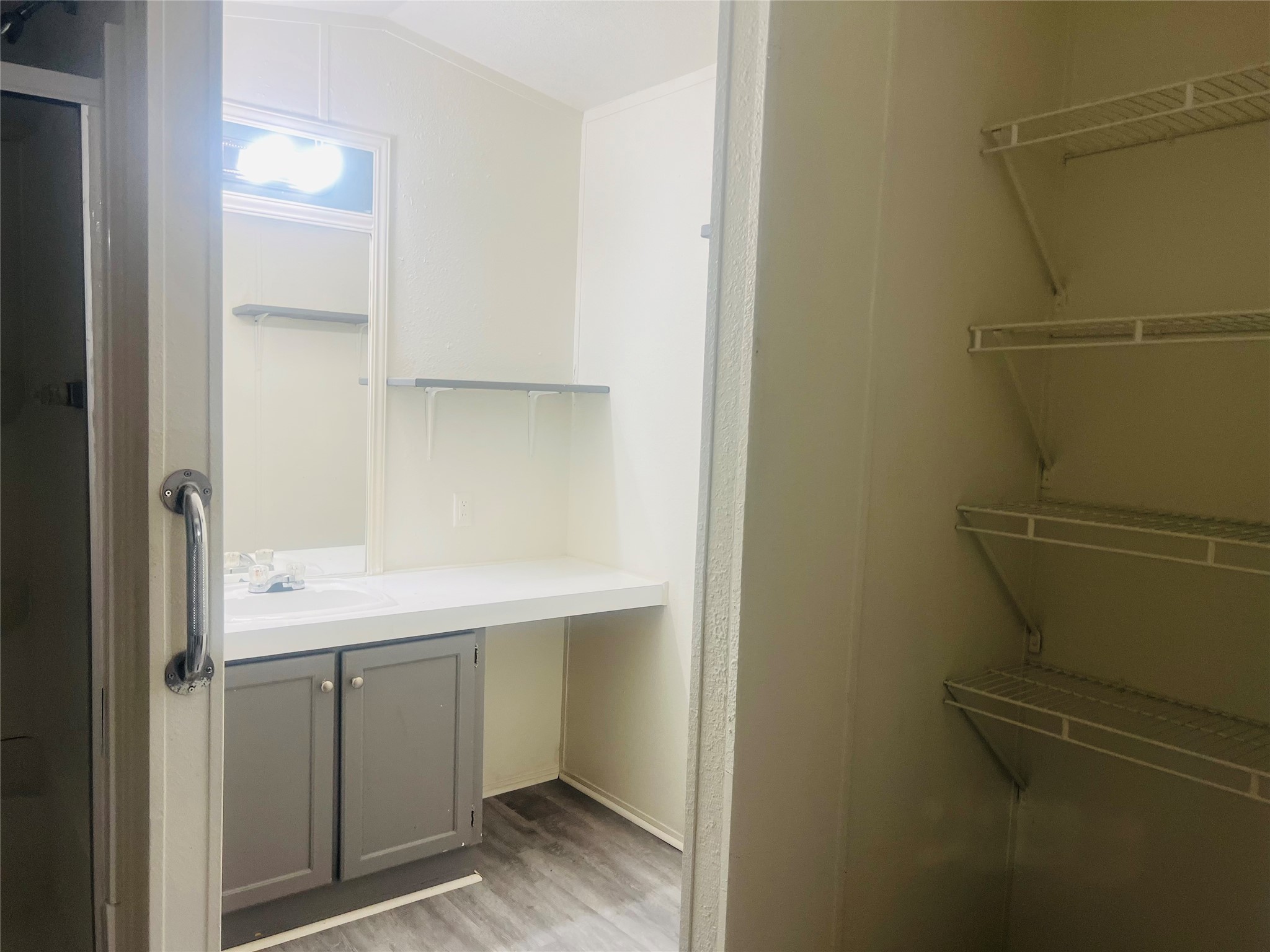 2106 Avenue C Rosenberg, TX 77471 - Photo 13 of 20 a room with a sink and cabinets