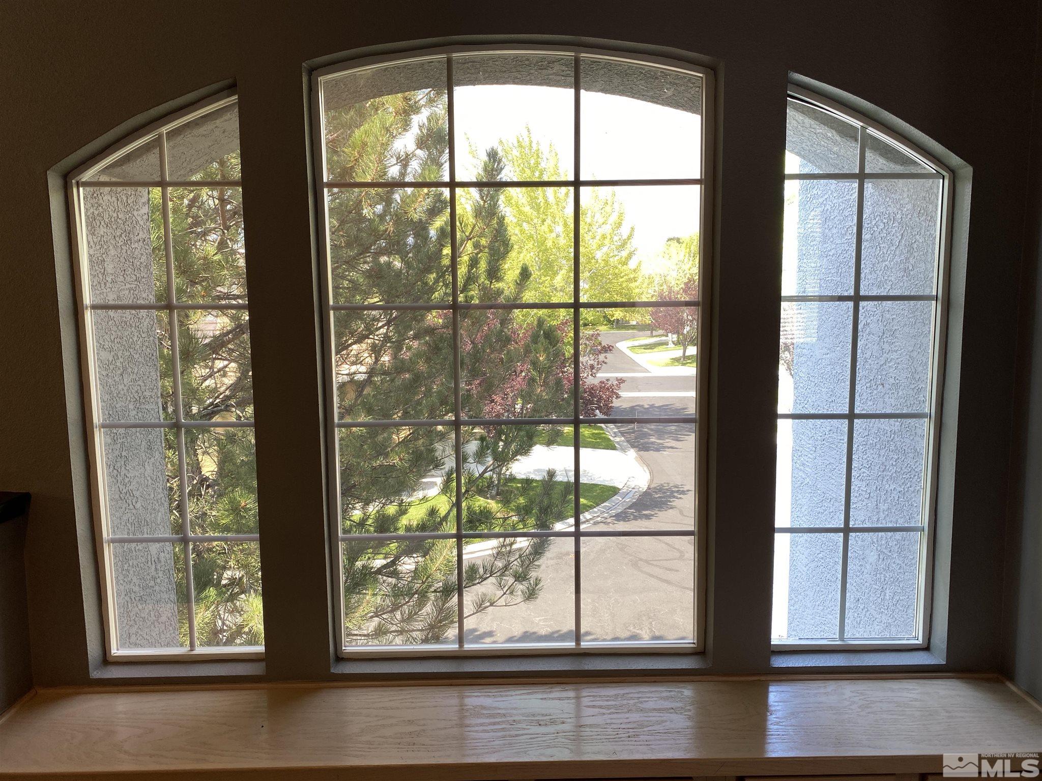 9636 Truckee Meadows Place Reno, NV 89521 - Photo 12 of 21 a view of a large window with a yard