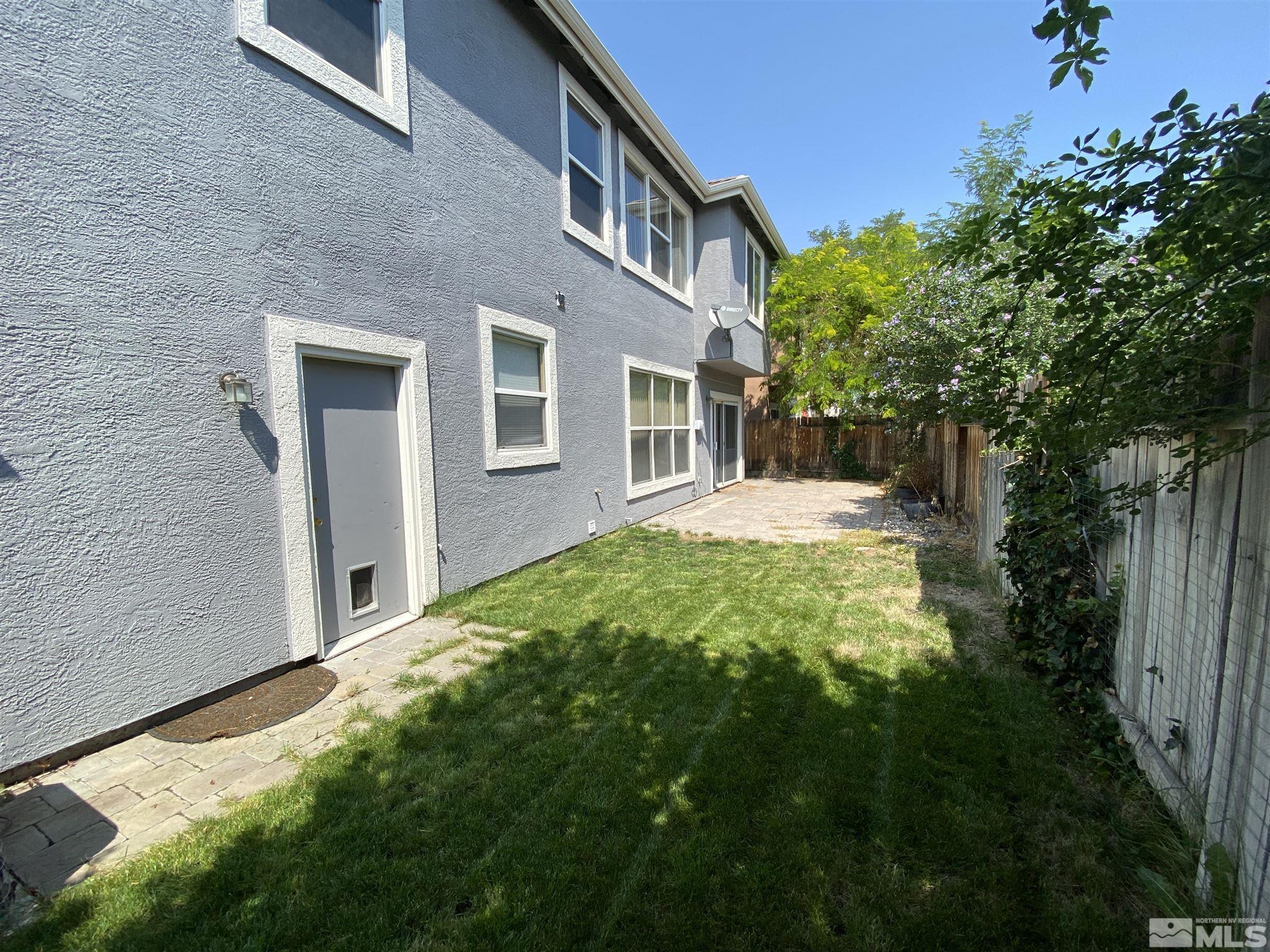 9636 Truckee Meadows Place Reno, NV 89521 - Photo 20 of 21 a house view with a garden space