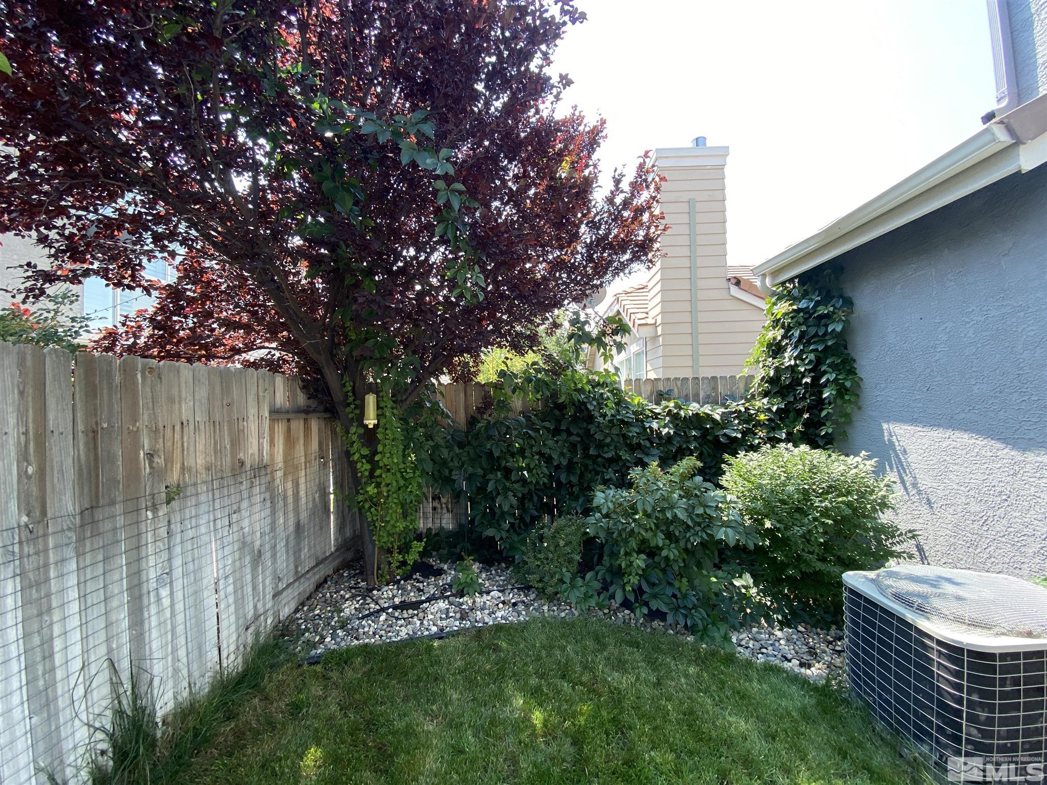 9636 Truckee Meadows Place Reno, NV 89521 - Photo 21 of 21 a view of an outdoor space and a yard