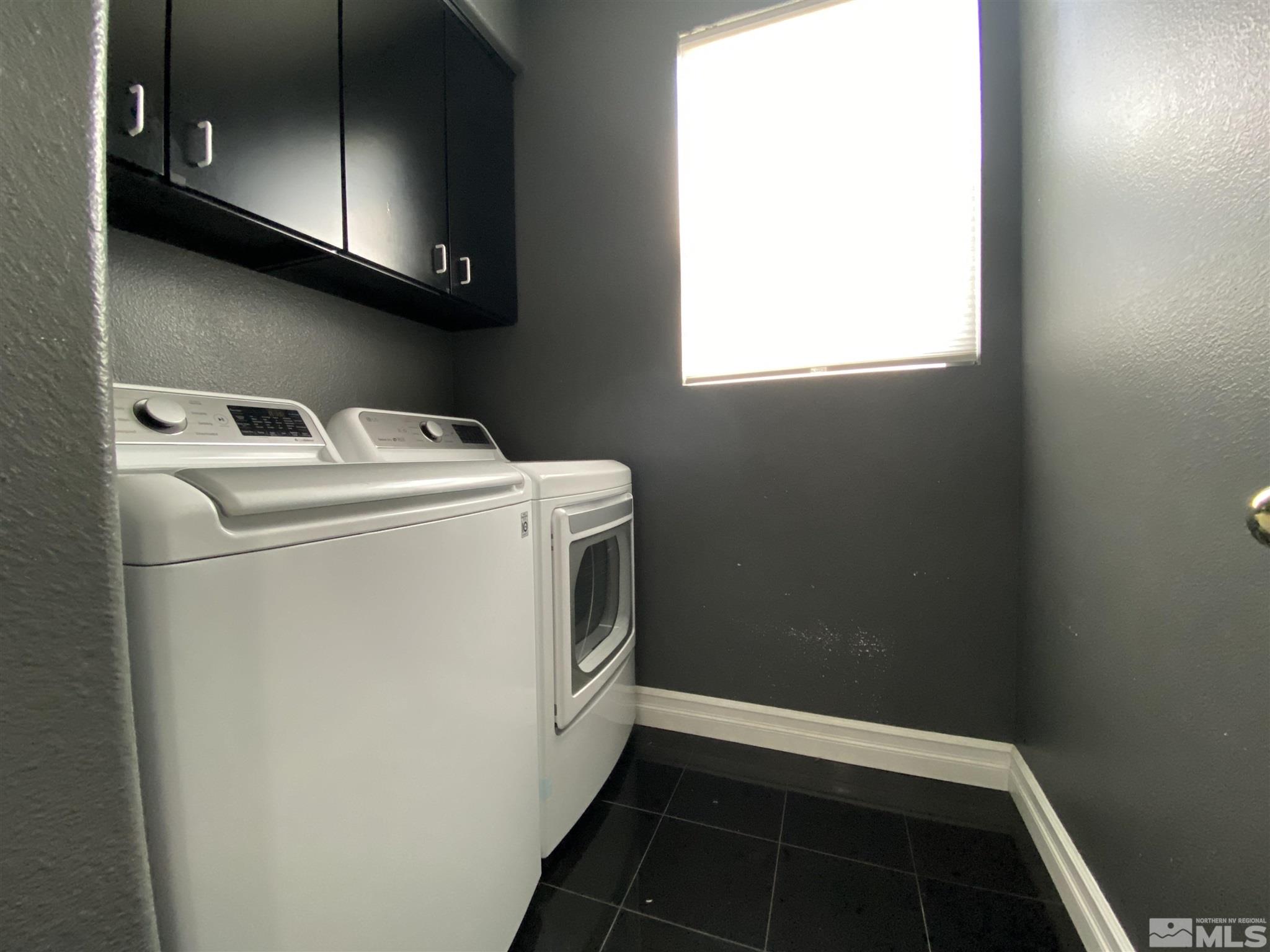 9636 Truckee Meadows Place Reno, NV 89521 - Photo 8 of 21 a utility room with dryer and washer