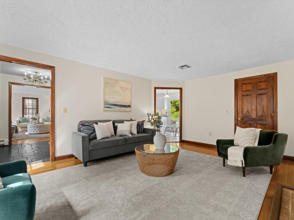 769 Edgell Road Framingham, MA 01701 - Photo 7 of 37 a living room with furniture and a window