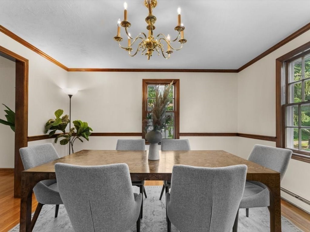 769 Edgell Road Framingham, MA 01701 - Photo 9 of 37 a dining room with furniture and window