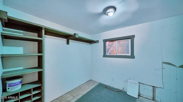 a view of room with racks on the wall