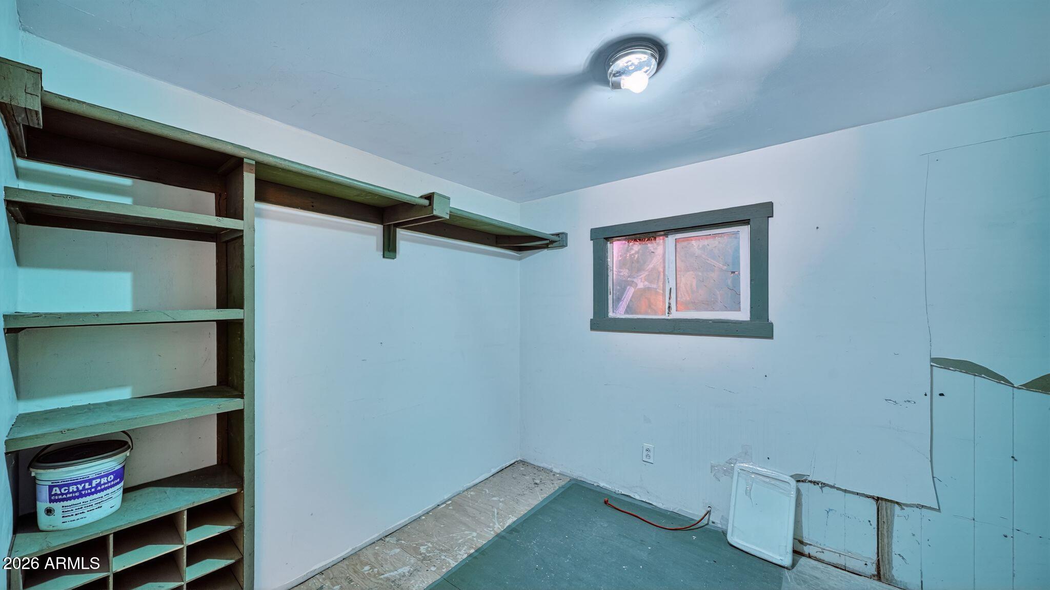 5675 Rocky Road Fort Mohave, AZ 86426 - Photo 13 of 30 a view of room with racks on the wall