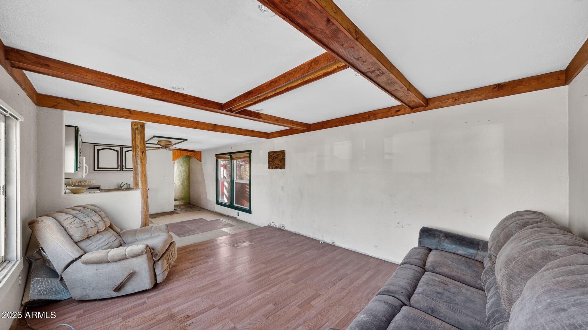 5675 Rocky Road Fort Mohave, AZ 86426 - Photo 19 of 30 a living room with furniture and wooden floor