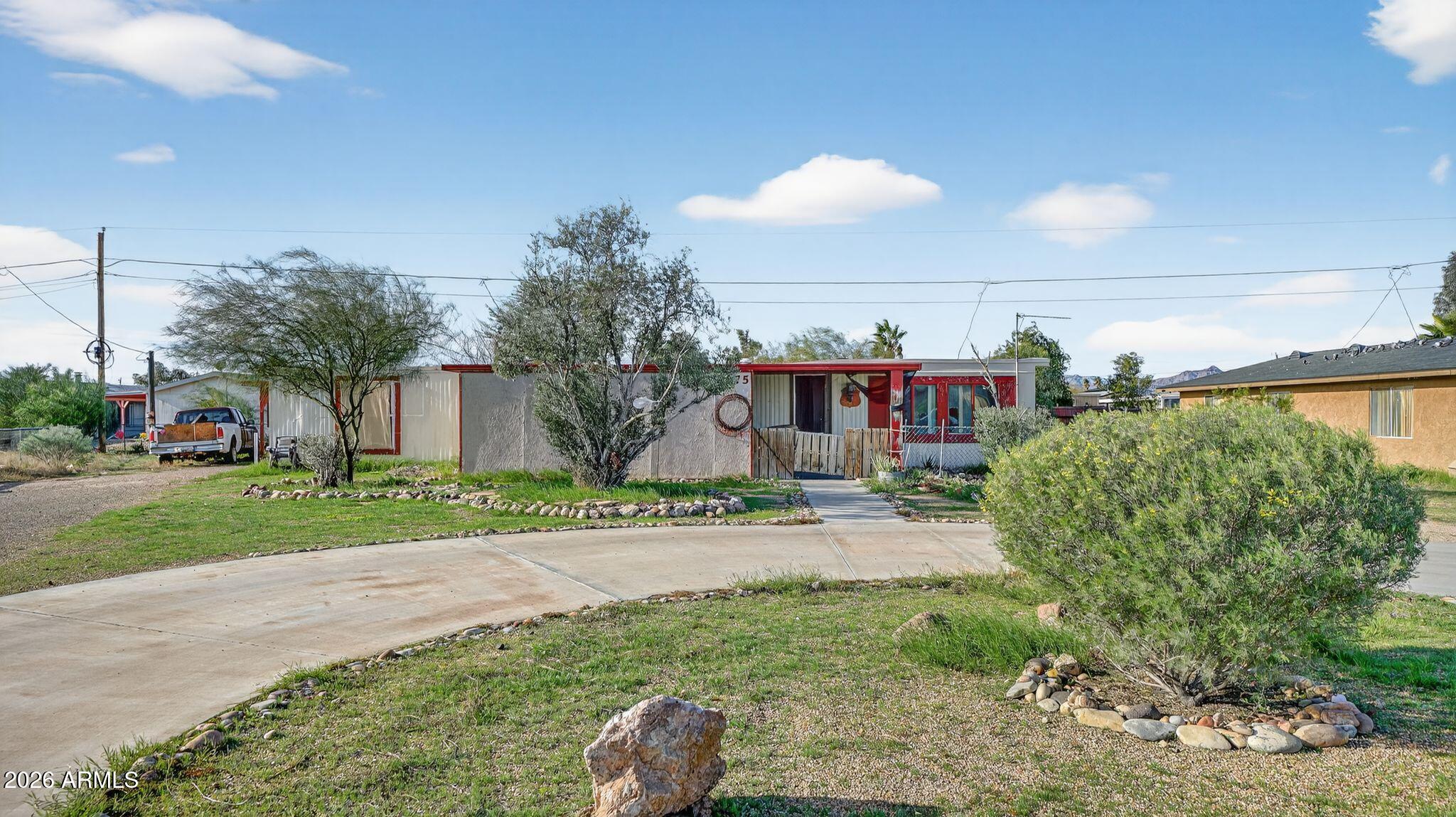 5675 Rocky Road Fort Mohave, AZ 86426 - Photo 8 of 30 a view of a street with a houses in the background