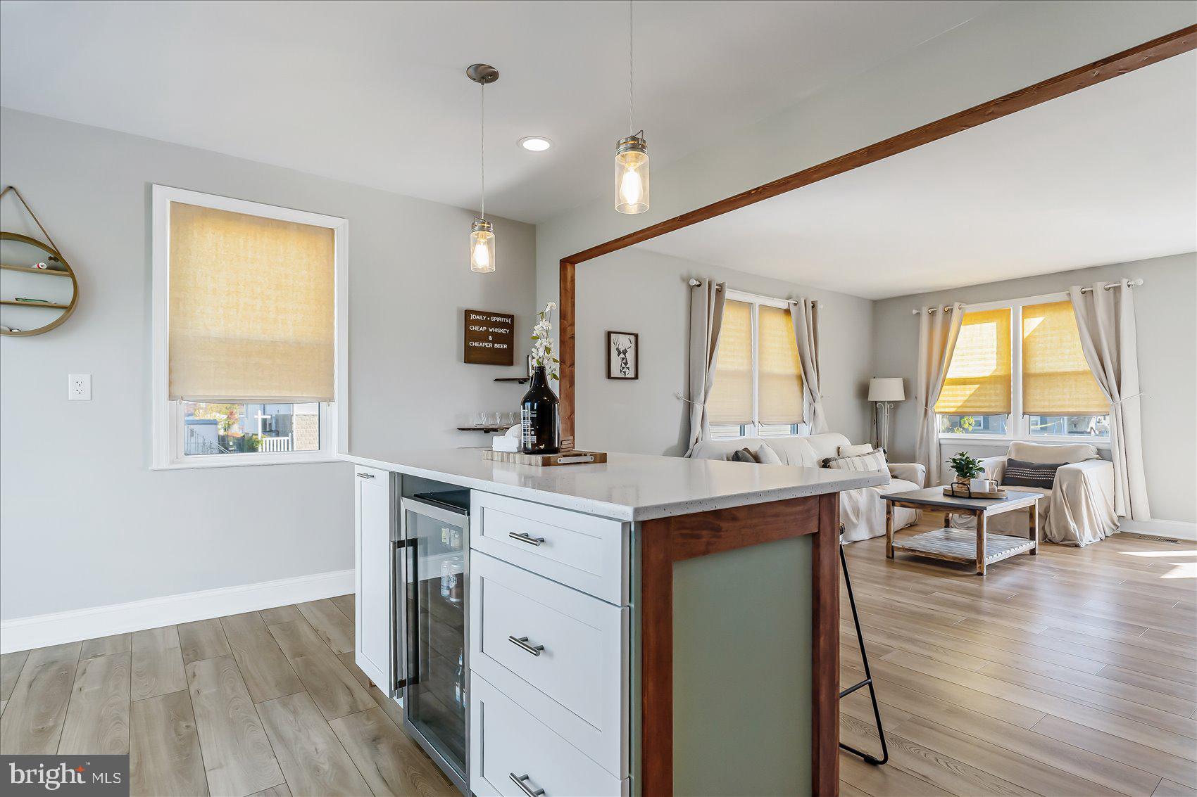 6934 River Drive Road Sparrows Point, MD 21219 - Photo 16 of 47 a view of living room with furniture and wooden floor