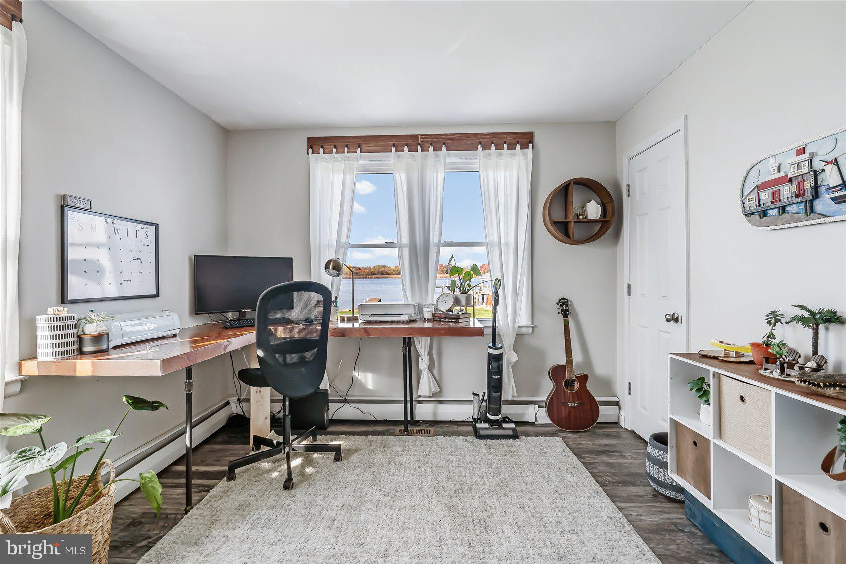 6934 River Drive Road Sparrows Point, MD 21219 - Photo 19 of 47 a view of a workspace with a window