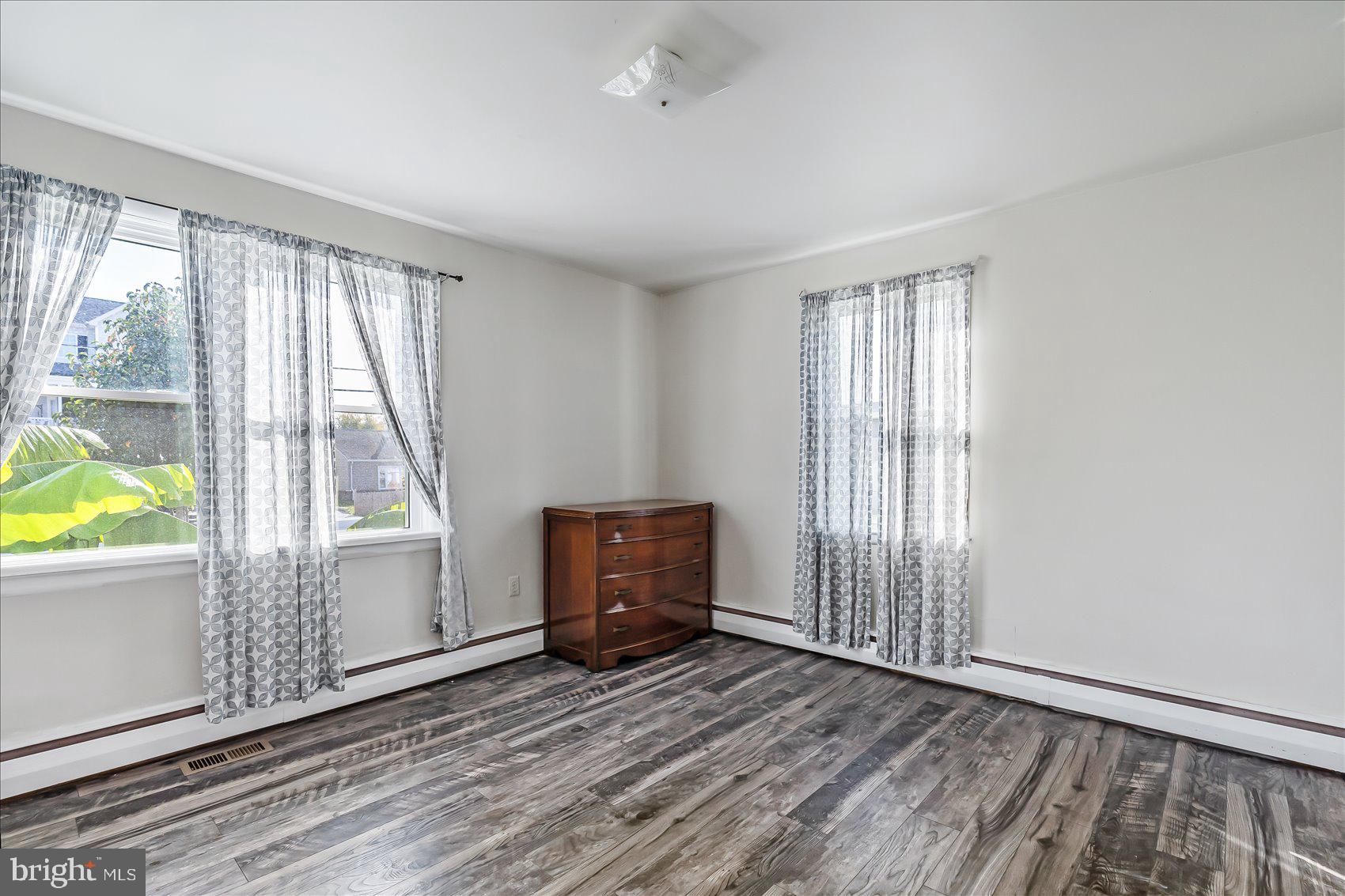 6934 River Drive Road Sparrows Point, MD 21219 - Photo 21 of 47 an empty room with windows