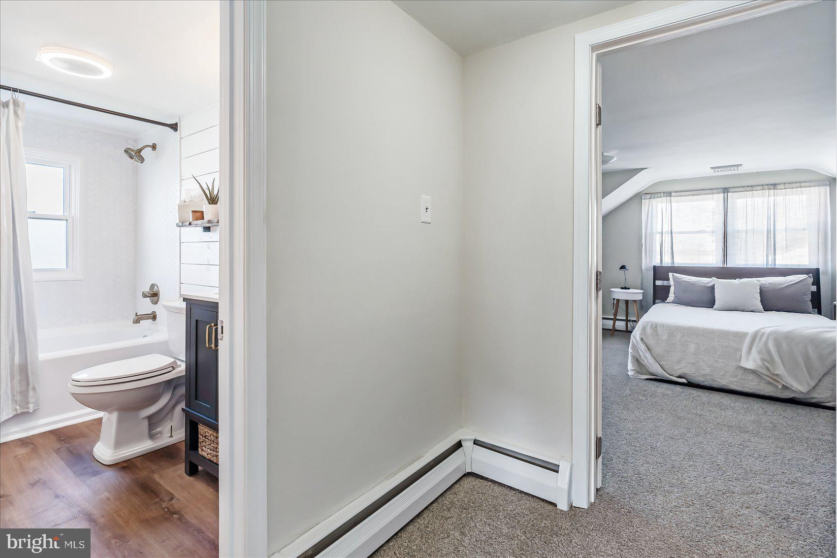 6934 River Drive Road Sparrows Point, MD 21219 - Photo 30 of 47 a en suite bathroom with a sink a toilet and a shower