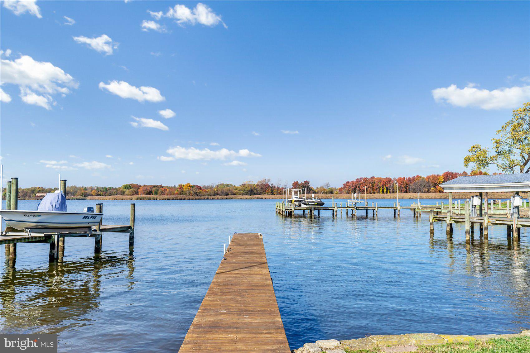 6934 River Drive Road Sparrows Point, MD 21219 - Photo 45 of 47 a swimming pool with outdoor seating and yard