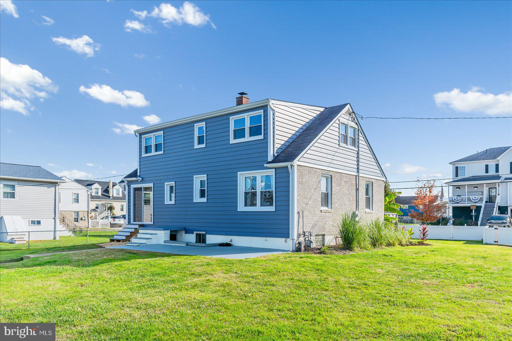 6934 River Drive Road Sparrows Point, MD 21219 - Photo 6 of 47 a house view with a garden space