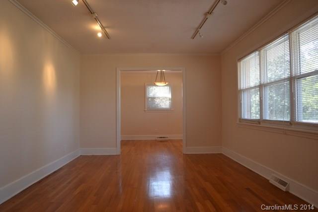 3421 Pinehill Road Rock Hill, SC 29732 - Photo 3 of 14 an empty room with wooden floor and windows