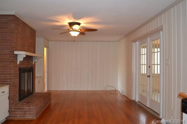 3421 Pinehill Road Rock Hill, SC 29732 - Photo 6 of 14 a view of an empty room with window and wooden floor
