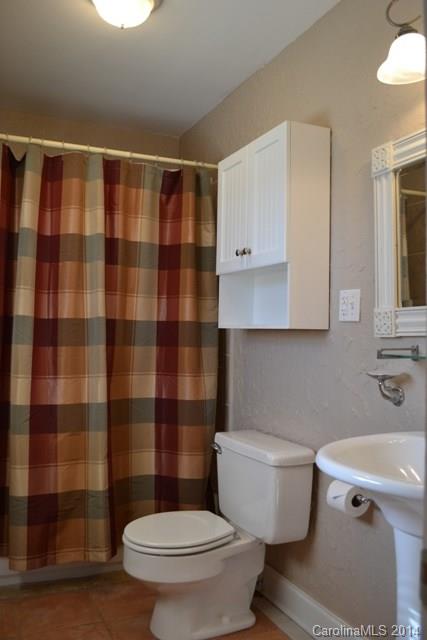 3421 Pinehill Road Rock Hill, SC 29732 - Photo 8 of 14 a bathroom with a toilet a sink and a shower