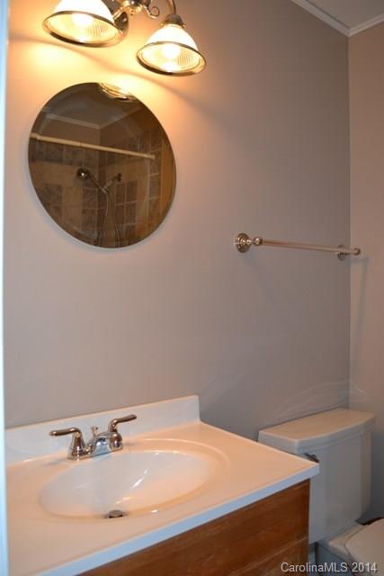 3421 Pinehill Road Rock Hill, SC 29732 - Photo 10 of 14 a bathroom with a sink and mirror