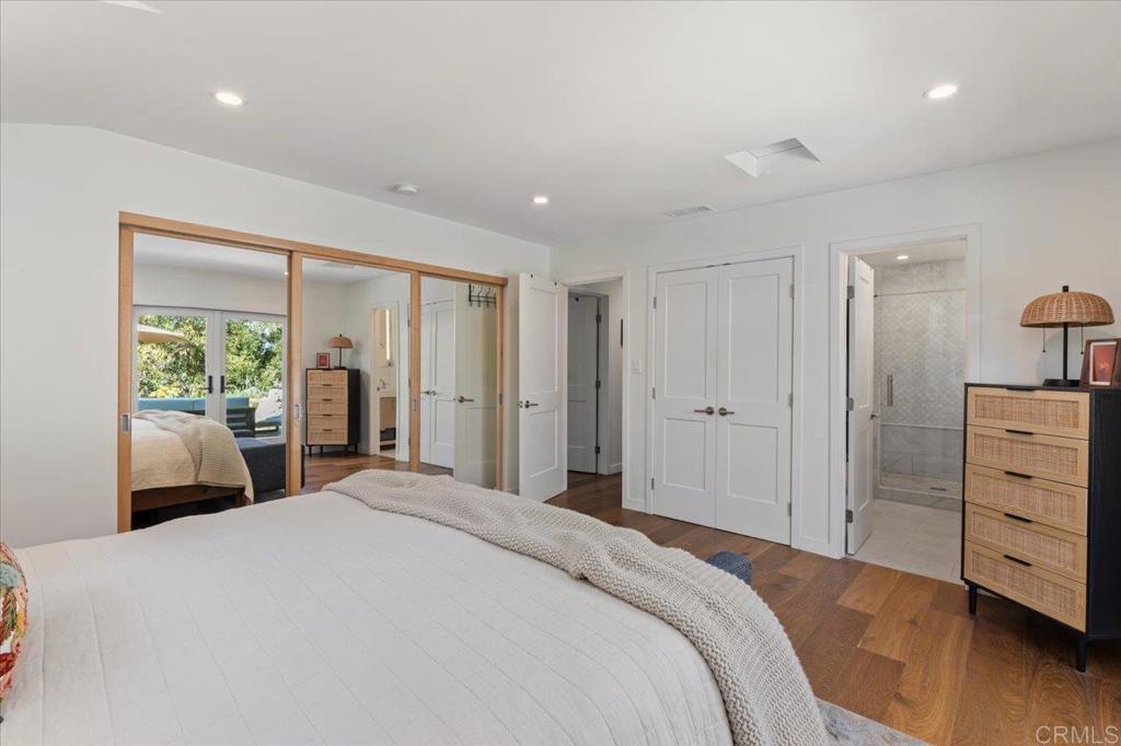 5125 El Secreto Rancho Santa Fe, CA 92067 - Photo 11 of 35 a bedroom with a bed and a large window